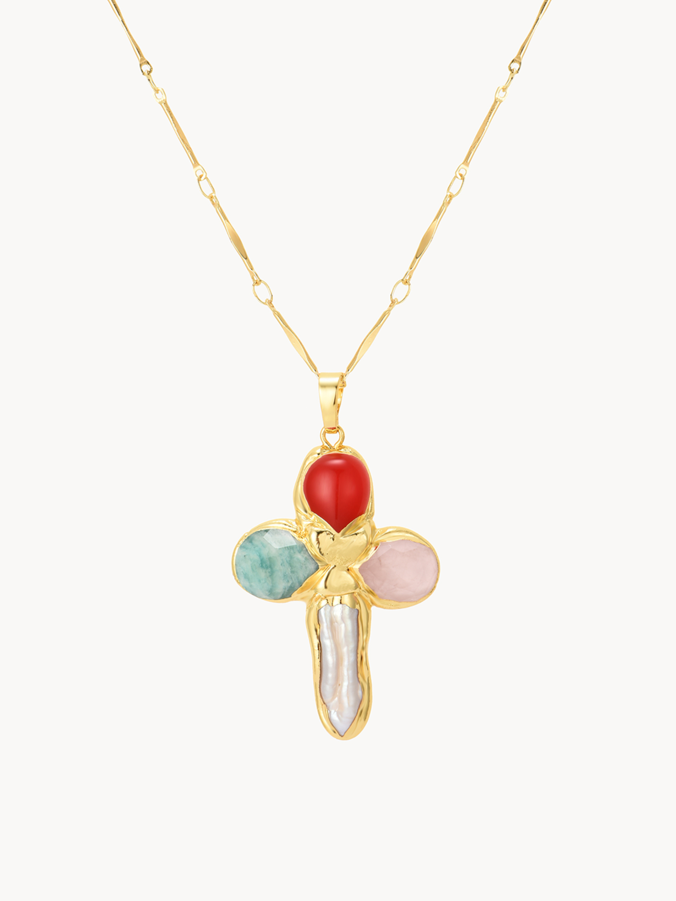 Gold necklace with a cross pendant featuring colorful gemstones